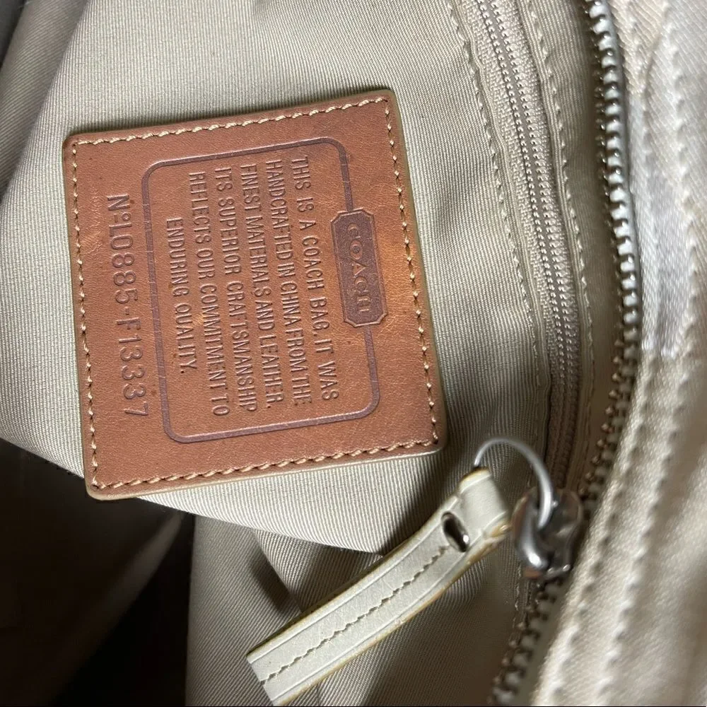 Coach Hampton beige and tan canvas logo and leather accents and trims Satchel.